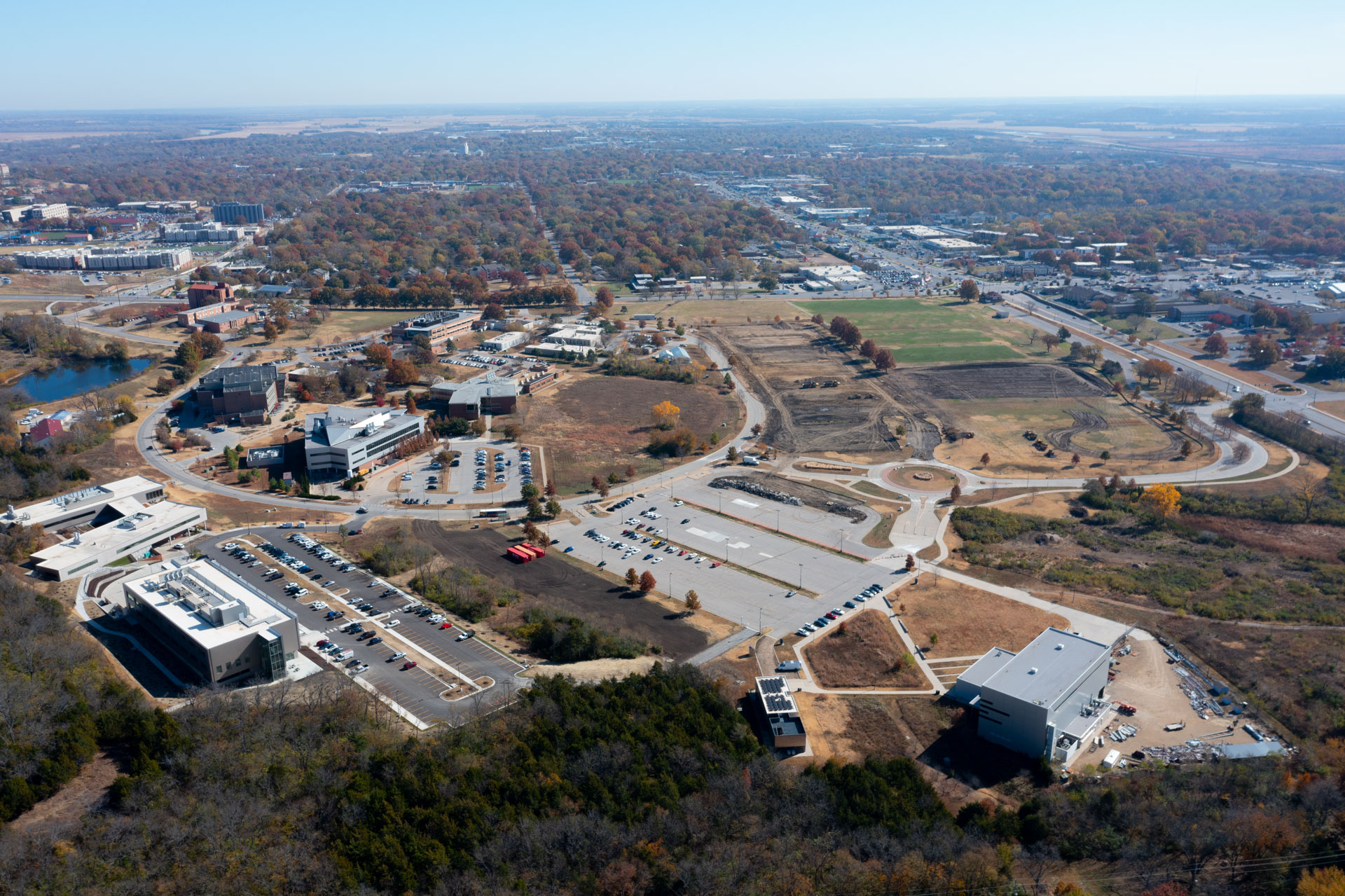 Drone shot of the Bioscience and Technology Business Incubator in Lawrence, KS and surrounding buildings.