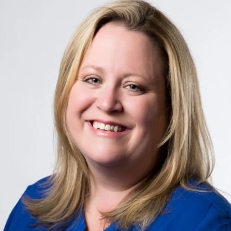 A portrait of Kerri Johnson smiling